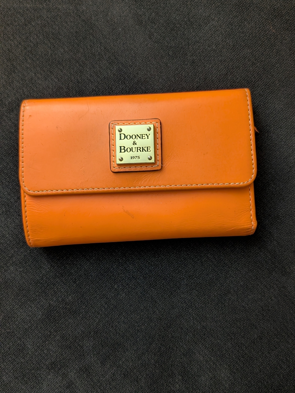 Dooney & Bourke Orange Leather Flip Wallet